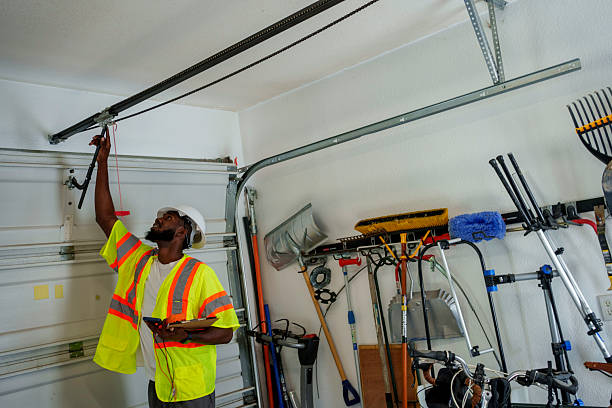Professional Garage Door technician working in Sawmills, NC